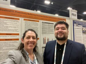 Orlando and Breanne with WPC 2026 Poster